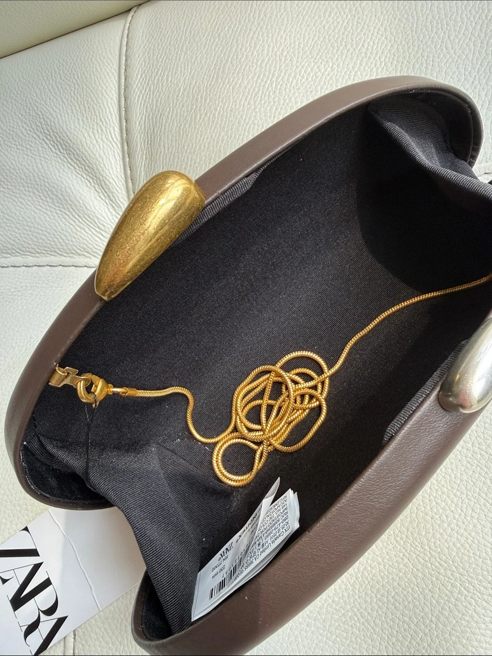 Zara Oval Dark BrownClutch with Metallic Accents